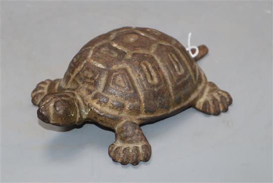 A cast iron tortoise, length 19.5cm